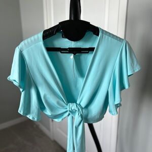 Aqua blue Crop top. Tie in front. Flowy sleeves.